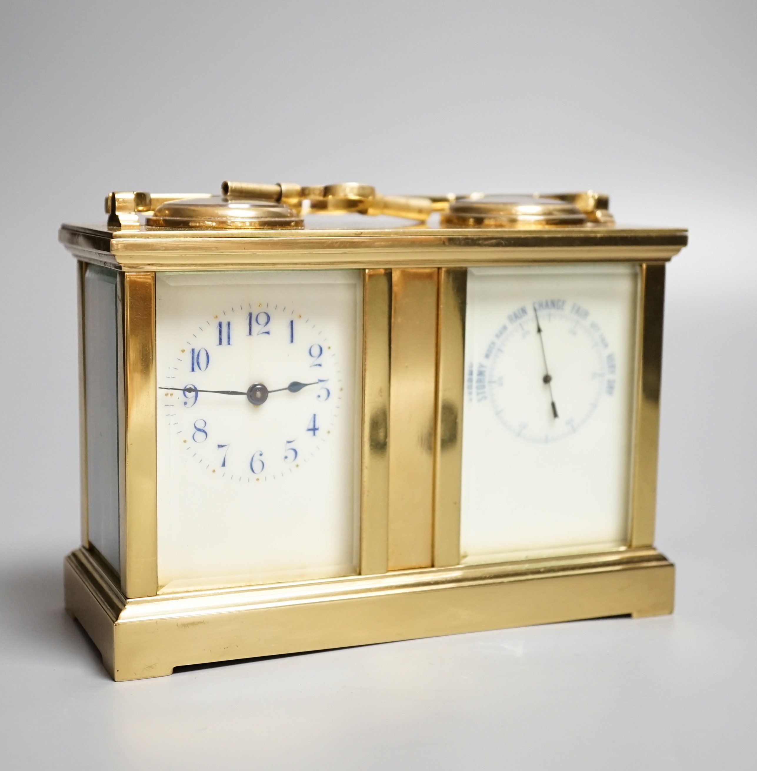 A late 19th century French brass cased eight day timepiece, combined barometer/compass, heighg 11cm